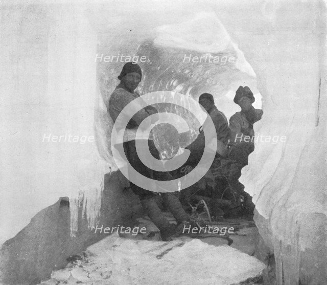 'The First Western Party in a Natural Ice-Tunnel', c1911, (1913). Artist: T Griffith Taylor.