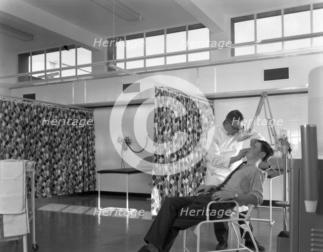 Medical care at a steelworks, Sheffield, South Yorkshire, 1963. Artist: Michael Walters