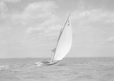 The 6 Metre class 'The Whim' (L6) sailing downwind, 1911. Creator: Kirk & Sons of Cowes.