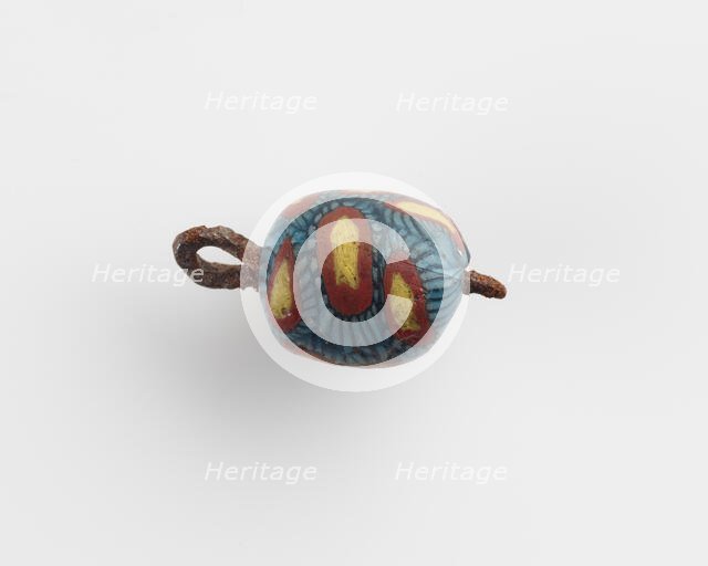 Bead, with a copper eyelet, Roman Period, 1st-2nd century. Creator: Unknown.