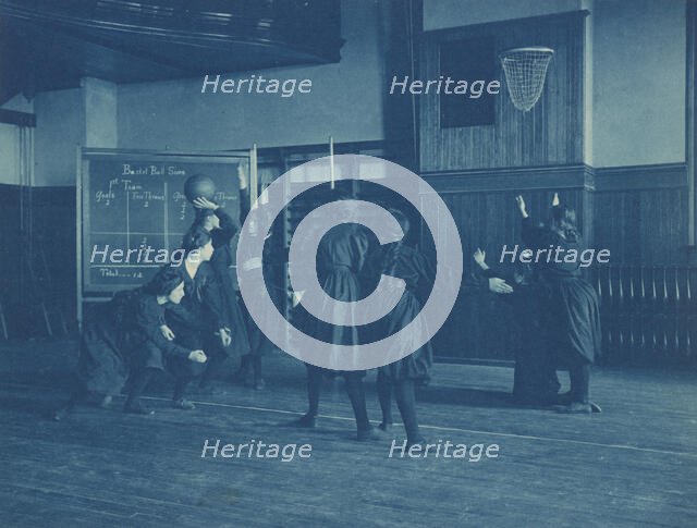 Female students playing basketball, Western High School, Washington, D.C., (1899?). Creator: Frances Benjamin Johnston.