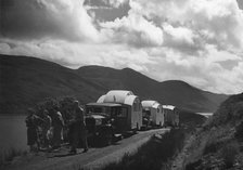 Group of cars and caravans camping in Scottish Highlands 1930's. Creator: Unknown.