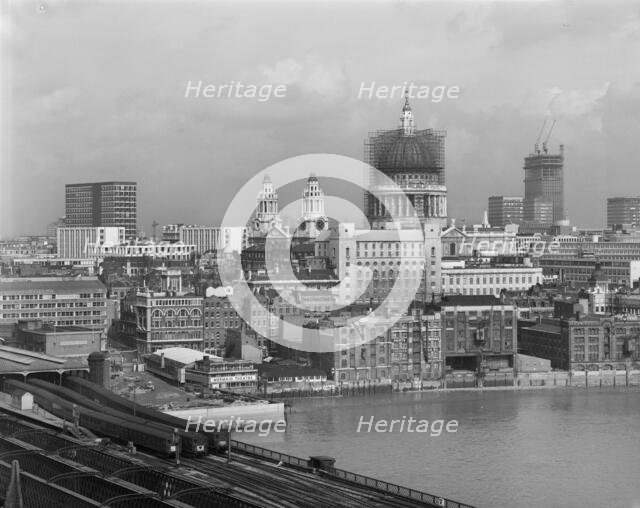 London skyline looking north-east from Blackfriars railway bridge, 03/03/1966. Creator: John Laing plc.