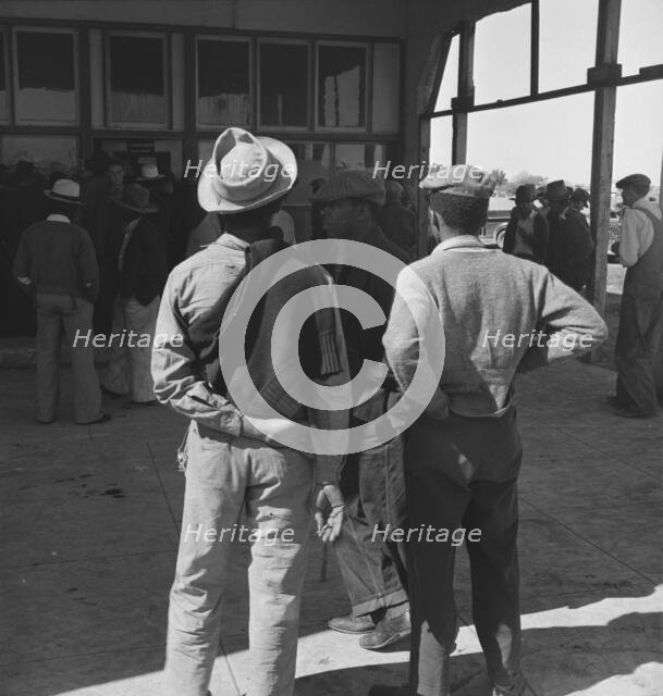 Outside the FSA grant office during the pea harvest, Calipatria, California, 1939. Creator: Dorothea Lange.