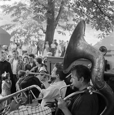 The brass section of a group of musicians, Hampstead Heath, London, c1946-c1959. Artist: John Gay