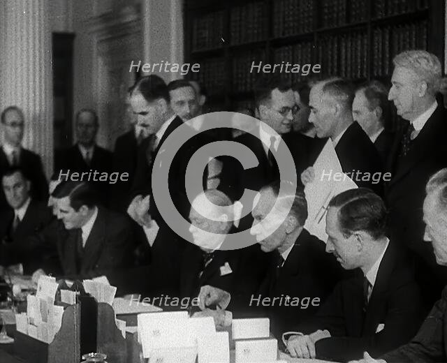 Winston Churchill and Wendell Willkie Signing an Agreement Allowing the USA to use British..., 1941. Creator: British Pathe Ltd.