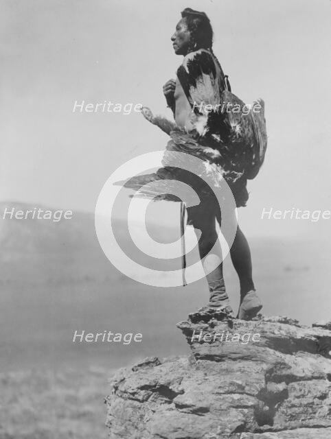The eagle catcher, c1908. Creator: Edward Sheriff Curtis.