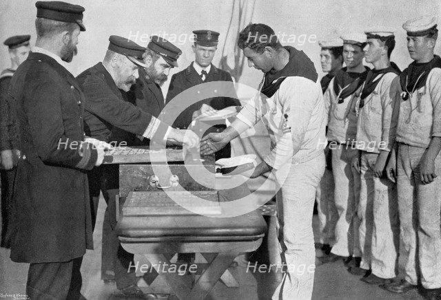 Pay day on board HMS 'Royal Sovereign', 1895. Artist: Gregory & Co