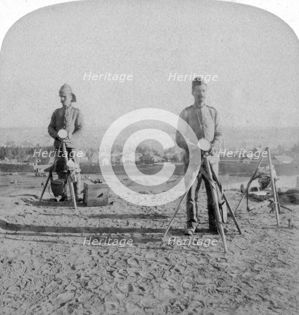 British heliographing from the Johannesburg Fort the news of the occupation, Boer war, 1900. Artist: Underwood & Underwood