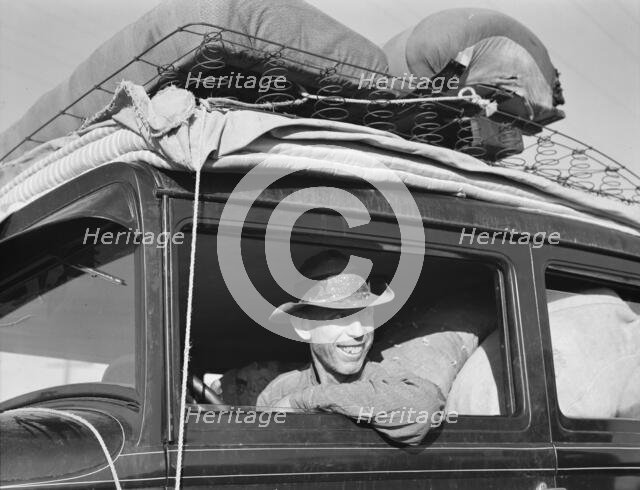 Farmer from Independence, Kansas, on the road at cotton chipping time, U.S. 99, California, 1939. Creator: Dorothea Lange.