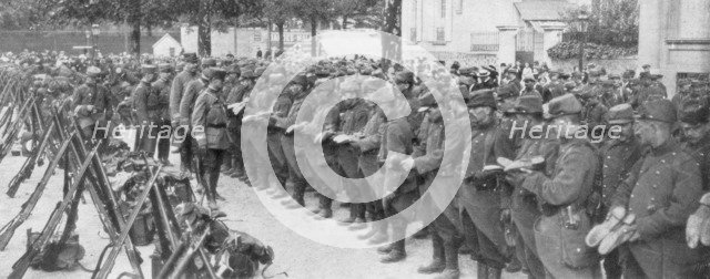 A colonel checking his soldiers' boots, Saint-Francois-Xavier, Paris, France, August 1914. Artist: Unknown