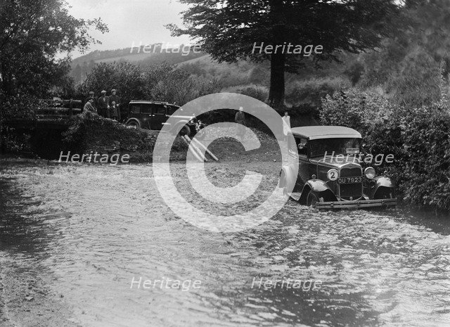 Ford Model A of JW Robbins fording the River Exe at Yealscombe, Devon, JCC Lynton Trial, 1932. Artist: Bill Brunell.