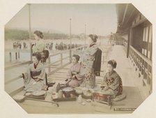 Japanese women at a meal in Kyoto, Between 1870 and 1890. Creator: Anonymous.