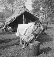 Children and home of migratory cotton workers, southern San Joaquin Valley, California, 1936. Creator: Dorothea Lange.