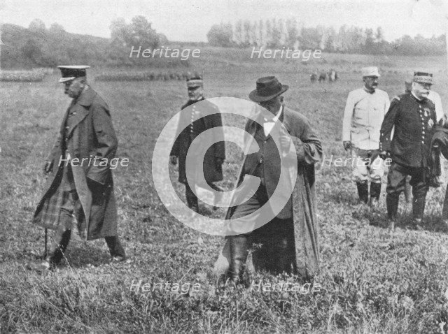 'Lord Kitchener's visit to the front: Lord Kitcheneer, M. Millerand, and General Joffre leaving afte Artist: Unknown.