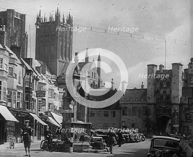 Wells Cathedral and Market Cross, Wells, Somerset, 1942.  Creator: British Pathe Ltd.