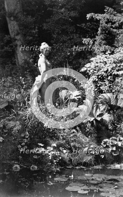 Statue by the pond, Park Place, Remenham, Berkshire, c1900. Creator: Farnham Maxwell Lyte.