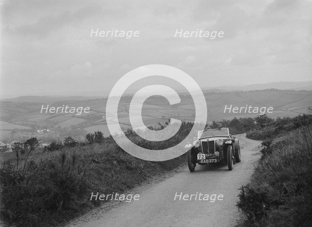 MG TA of NH Grove competing in the MCC Torquay Rally, 1938. Artist: Bill Brunell.
