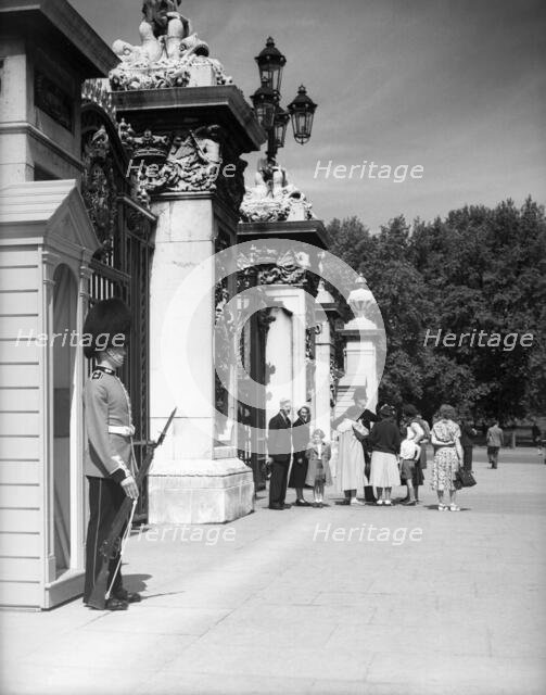 Sentry at Buckingham Palace, London, c1955.  Creator: Arthur Charles Kirby Ware.