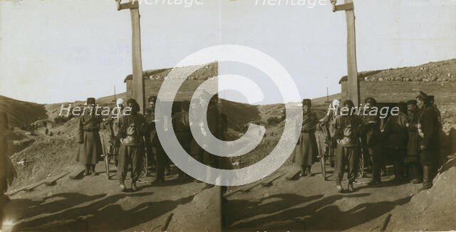 Carrying wounded Russian in a jinriksha from the front down to the hospital in Port Arthur, c1905. Creator: Underwood & Underwood.