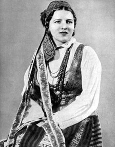 Lithuanian woman in traditional dress, 1936. Artist: Geoffrey L Portham