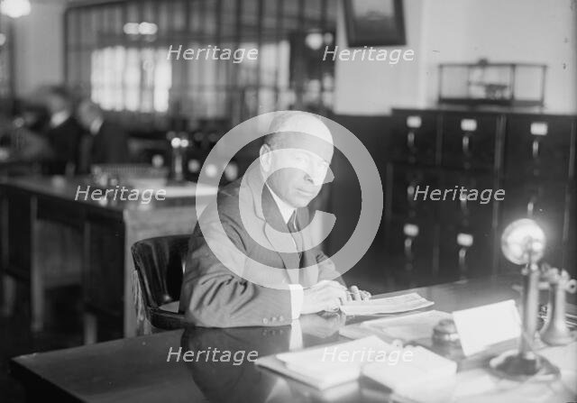Edmund W. Bonnaffon, Pay Inspector, Navy Yard - At Desk, 1916. Creator: Harris & Ewing.