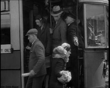 People Getting Off a Tram, 1936. Creator: British Pathe Ltd.