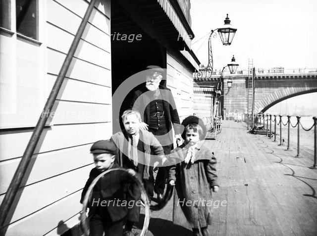 Group of children on Waterloo Pier, London, c1905. Artist: Unknown