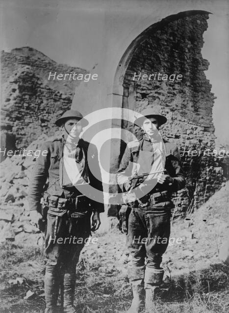U.S. soldiers & German pistol, 11 Mar 1918. Creator: Bain News Service.