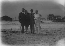 Arnold Genthe with friends in Long Beach, New York, between 1911 and 1942. Creator: Arnold Genthe.