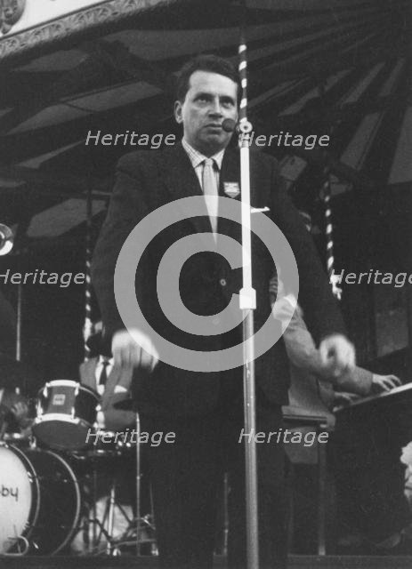 George Melly with Mick Mulligan Band, Beaulieu Jazz Festival, Hampshire, 1960. Creator: Brian Foskett.