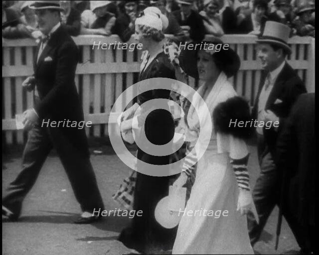 Well Dressed Men and Women at a Race Meeting, 1933. Creator: British Pathe Ltd.