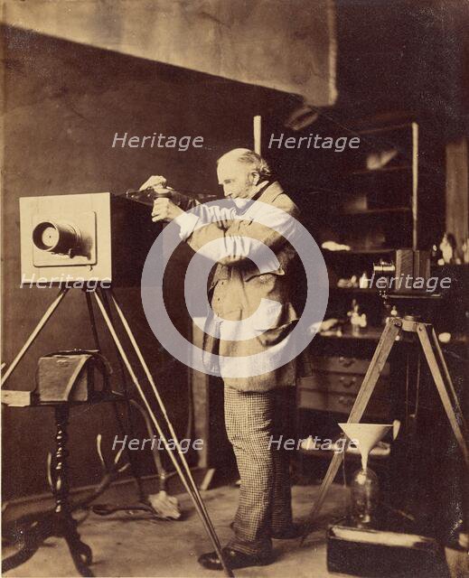 Self-portrait preparing a Collodion plate, 1856-1859. Creator: Horatio Ross.