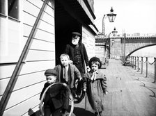 Group of children on Waterloo Pier, London, c1905. Artist: Unknown