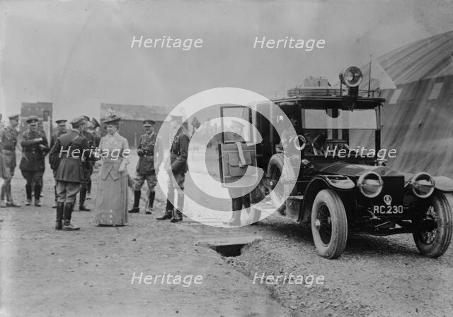 Queen Mary visits aerodrome shed, 5 Jul 1917. Creator: Bain News Service.