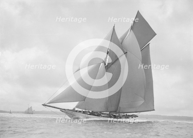The beautiful schooner 'Cetonia' making good headway, 1911. Creator: Kirk & Sons of Cowes.