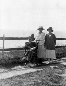 A physically disabled boy sitting in a wheelchair,  c1910/1925. Creator: Unknown.