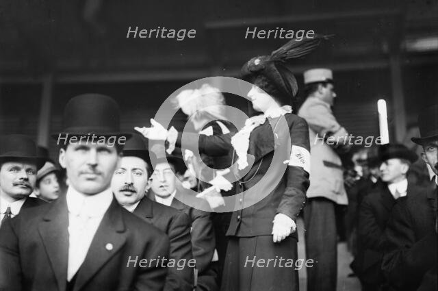 Chorus girl raising money at TITANIC game, 1912. Creator: Bain News Service.