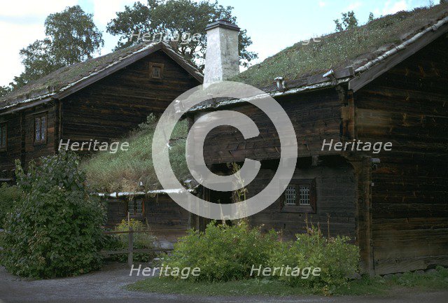 Traditional Swedish farm building with a turf roof. Artist: Unknown