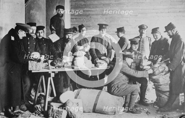 British and French prisoners assorting mail, between 1914 and c1915. Creator: Bain News Service.
