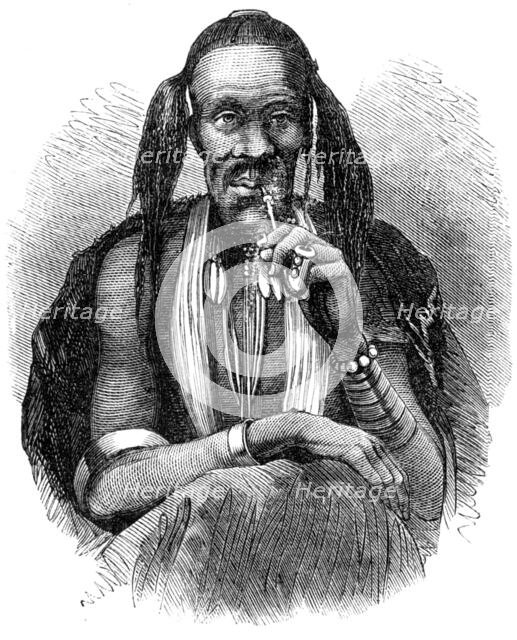 'A kaffir witch doctor, 1864'.  Creator: Unknown.