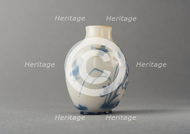 White glass snuff bottle with blue overlay, China, Qing dynasty, 1644-1911. Creator: Unknown.