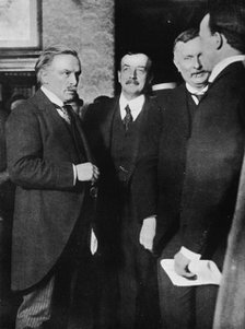 'Mr. Lloyd George, Mr. Runciman, and Mr. Henderson at the Park Hotel, Cardiff, after their interview Artist: Unknown.