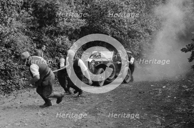 Amilcar of HP Powell, B&HMC Brighton-Beer Trial, Simms Hill, Ilsington, Devon, 1930. Artist: Bill Brunell.