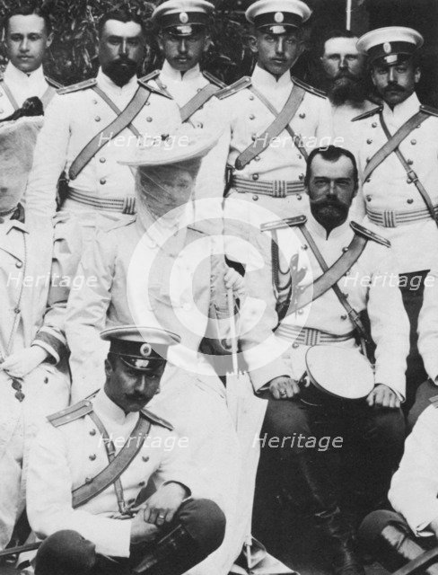 Tsar Nicholas II and Tsarina Alexandra Fyodorovna of Russia with a group of army officers, c1904. Artist: Unknown