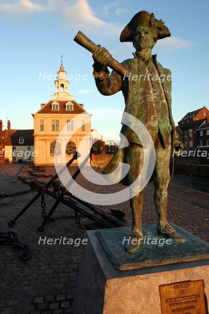 Statue of Captain Vancouver at dusk on the Purfleet Quay, King's Lynn, Norfolk.