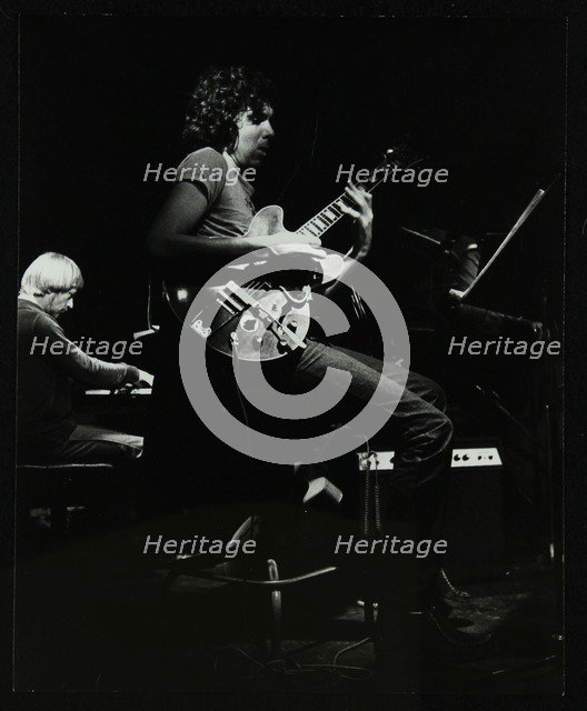 Michael Garrick and John Etheridge playing at The Stables, Wavendon, Buckinghamshire. Artist: Denis Williams