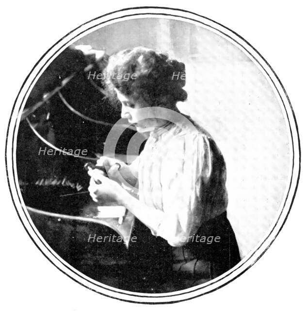 The cigarette-maker: cutting, 1909. Creator: Unknown.