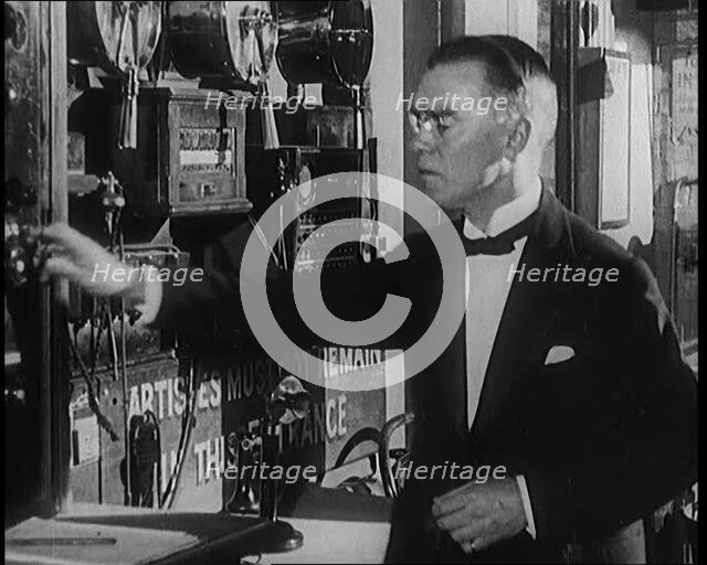 Male Civilian Working Theatrical Equipment Back Stage at a Theatre, 1920s. Creator: British Pathe Ltd.