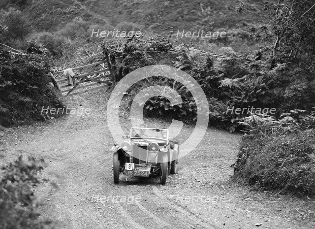 1935 MG PB of the Cream Cracker Team taking part in a motoring trial in Devon, late 1930s. Artist: Bill Brunell.